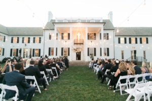 Outdoor wedding ceremony on lawn