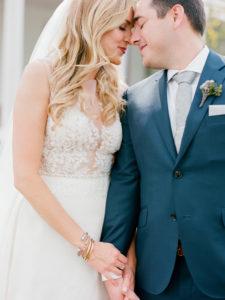 bride and groom touch foreheads