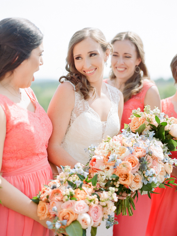 Bridesmaids and bride with bouquet