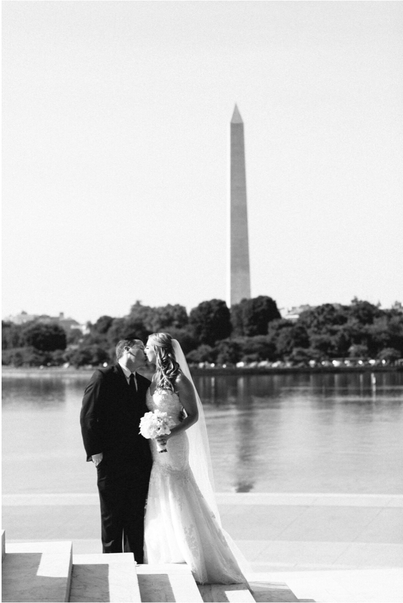 Bride and groom at washington DC monument, taken by astrid photo