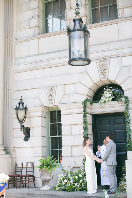 bride and groom say their vows together at their Anderson House Wedding in Washington DC
