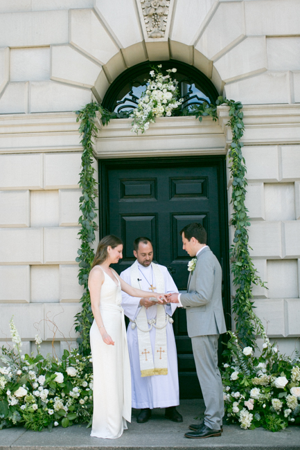 bride and groom say their vows together at their Anderson House Wedding in Washington DC