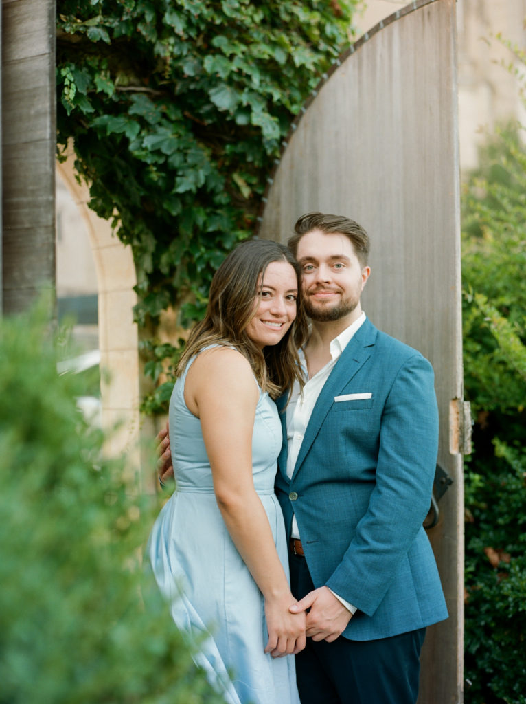 couple holding hands in the garden during their engagement session in washington DC