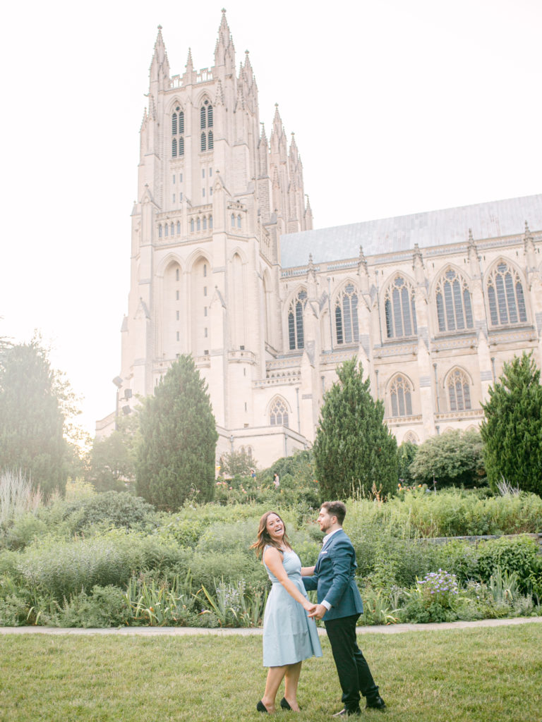 couple laughing during their engagement session at The Washington National Cathedral